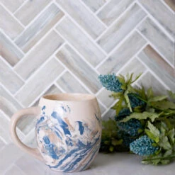 11" X 12.6" Recycled Glass Herringbone Mosaic In Wood Color